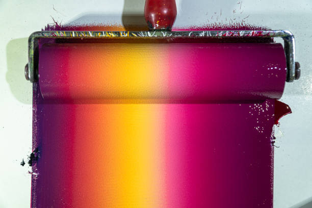 istock Mixing colors using a roller to roll over the ink. 1184210923