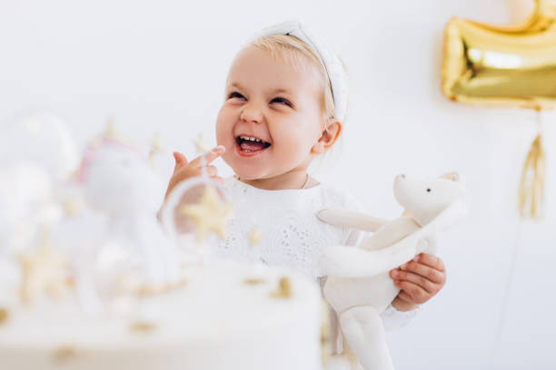 istock The child eats cake with appetite. Birthday baby. 1184211268