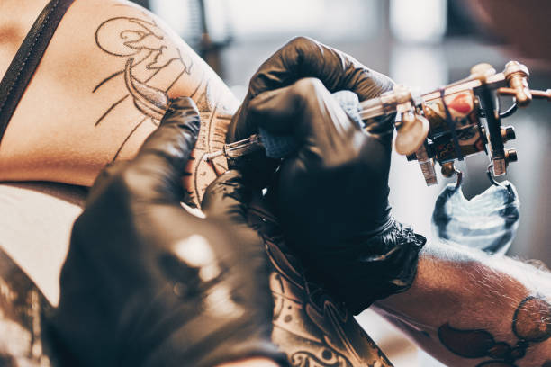 istock Close-up of tattoing a shoulder 1184211641