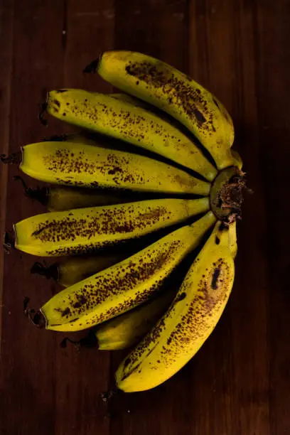 Banana peel on dark wooden table
