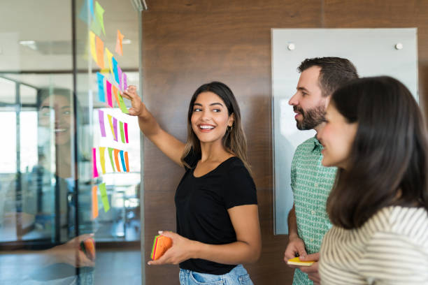 istock Professionals Planning Over Meeting In Office 1184213915