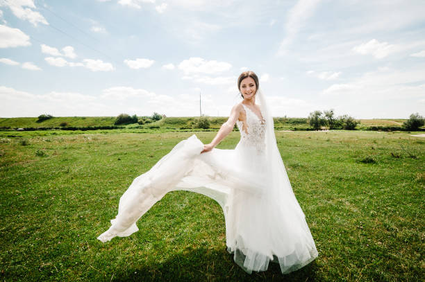 istock Portrait of beautiful bride on nature. 1184215023