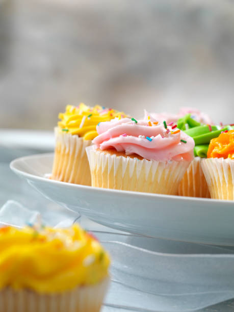 istock Colorful Cupcakes with Candy Sprinkles 1184215172