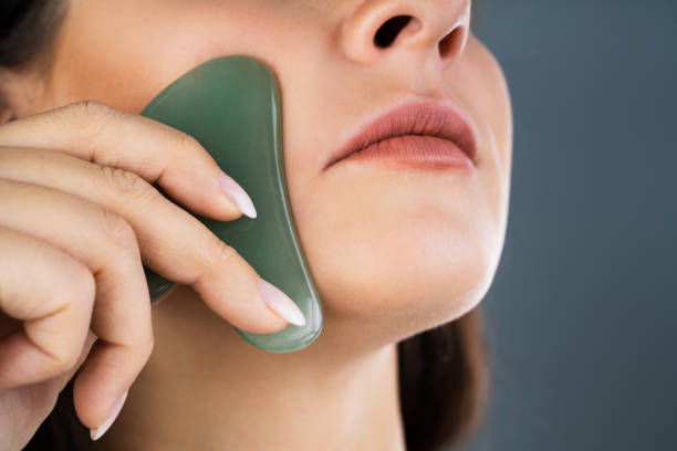 Young Woman Doing Gua Sha