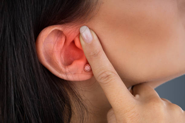 istock Woman Suffering From Sore Ear 1184215946