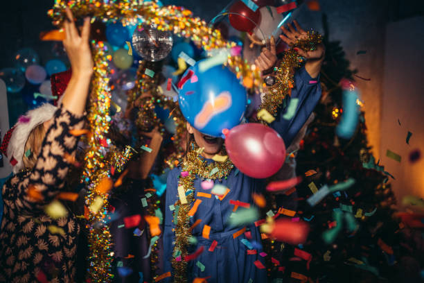 istock Happy friends celebrating New Year 1184216029