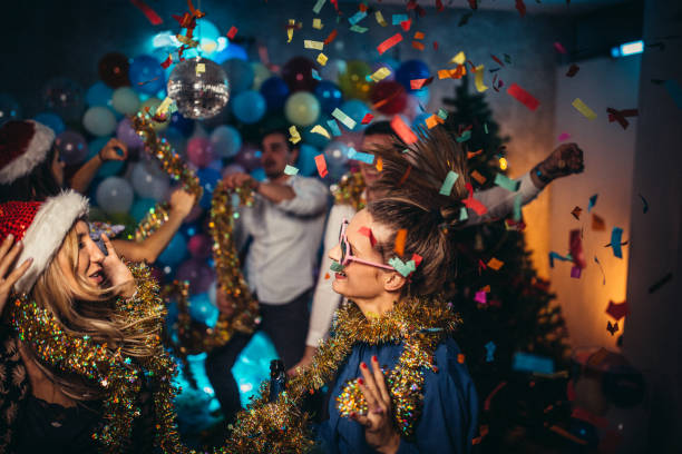 istock Happy friends celebrating New Year 1184216835