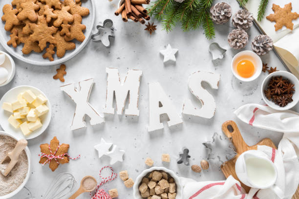 istock Christmas or Xmas baking culinary background. Ingredients for cooking on kitchen table. New Year or Noel holiday festive decorations. Greeting card 1184217097