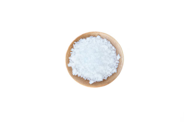 istock Salt in bowl isolated on white background 1184217983