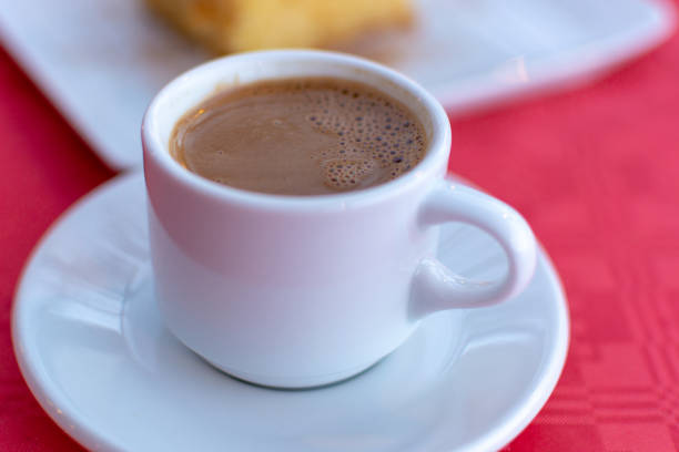 istock Traditional greek coffee served in white coffee set in cafe 1184224444