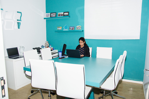 indoor space coworking, one person using computer