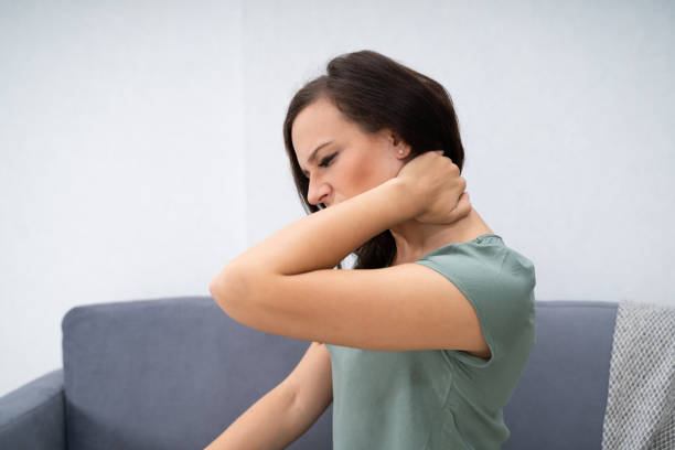istock Woman Having Neck Pain 1184225727
