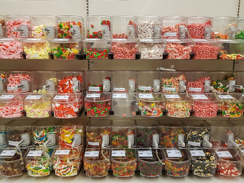Collection of candy for sale in supermarket