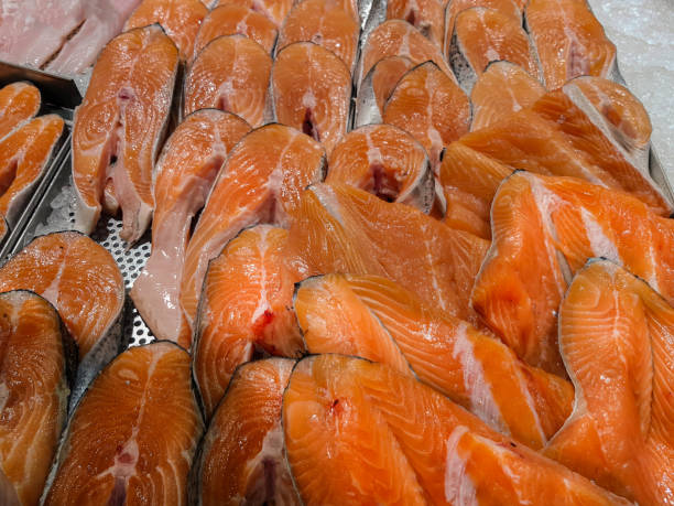 istock Fresh salmon slices for sale 1184225825
