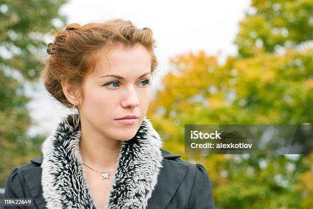 Redhaired Pensive Woman Stock Photo - Download Image Now - Adult, Adults Only, Autumn