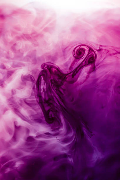 istock Soft and interesting streaks of paint under water with a dark background. Ideal for use as a background. 1184229257