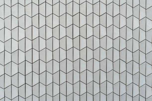 istock Textured wall of trapezoid cells 1184229442