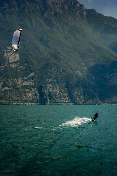 istock kitesurfer on lake garda in Italy 1184230971