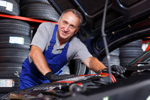 istock Mechanic repairing car 1184233856