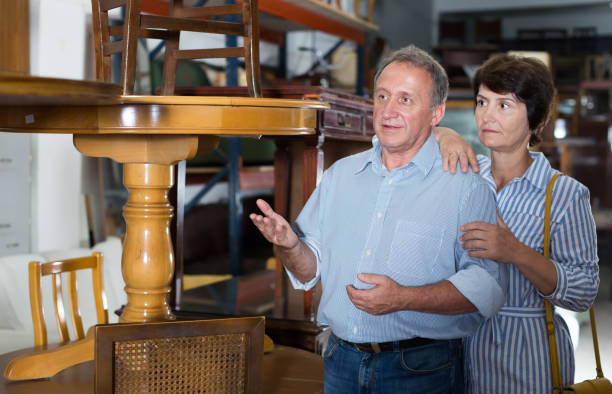 istock Mature couple is shopping the old table 1184233885