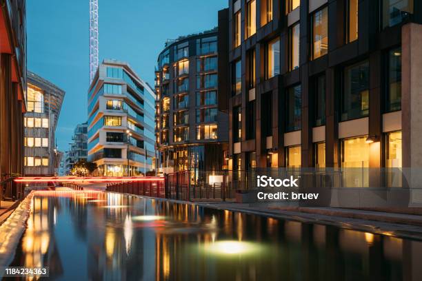 Oslo Norway Night View Embankment And Residential Multistorey Houses In Tjuvholmen District Summer Evening Residential Area Reflected In Sea Waters Stock Photo - Download Image Now
