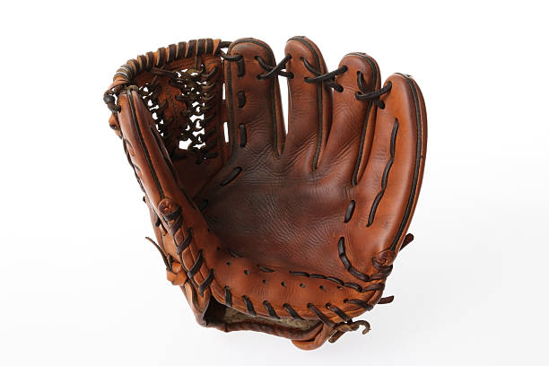 isolated shot of бейсбольная перчатка на белом фоне - baseball glove фотографии стоковые фото и изображения