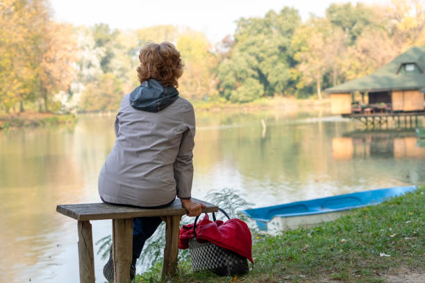 istock Senior woman enjoying in nature 1184235022