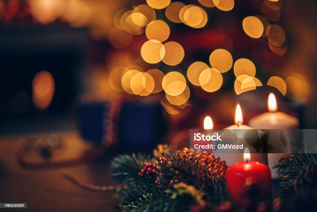 Christmas Decoration with Candles and Holiday Lights Christmas Stock Photo