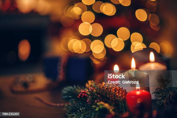 Christmas Decoration With Candles And Holiday Lights Stock Photo - Download Image Now
