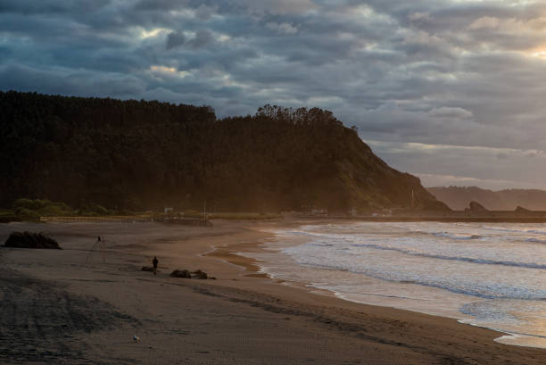 istock Sunset on Asturias beach. Clouds over the Cantabrian Sea 1184235365