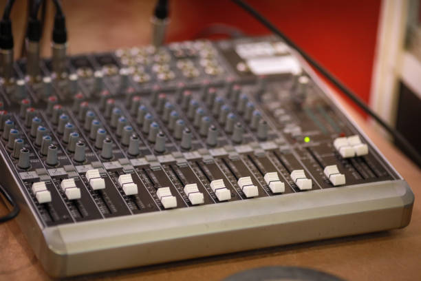 istock Shallow depth of field (selective focus) image with the controls on an audio mixer 1184235536