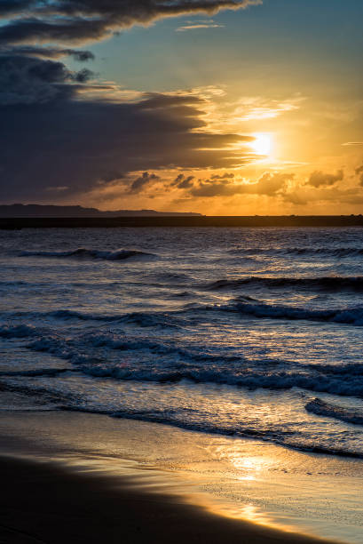 istock Sunset on Asturias beach. Clouds over the Cantabrian Sea 1184235573