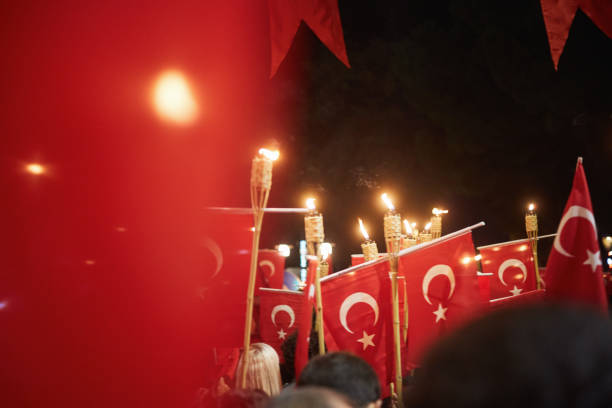 Mugla,TURKEY-October 29,2019: Celebration of the 93th Anniversary of the Republic Day. People are walking on the streets of Mugla with the Turkish flag in their hands.