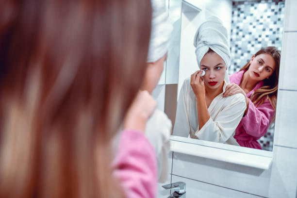 istock Females Cleaning Makeup 1184242896