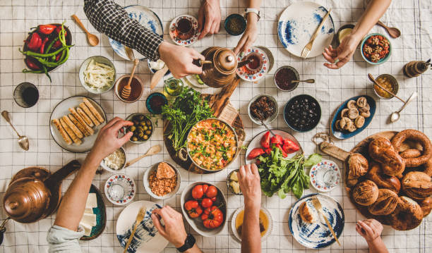 istock Flat-lay family having traditional Turkish breakfast with black tea 1184246019