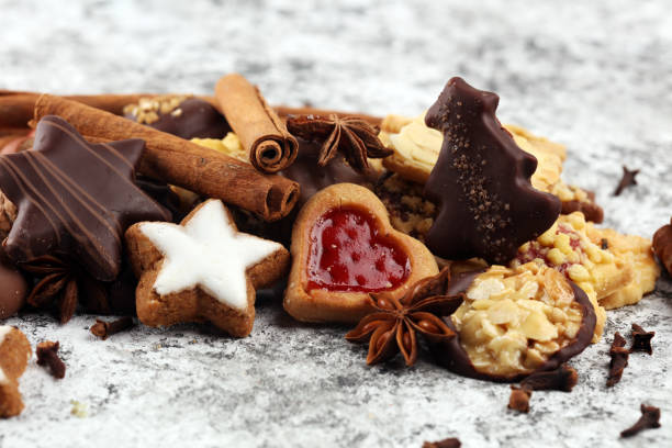 istock christmas cookies with spieses, nuts and fruits on rustic table 1184248696
