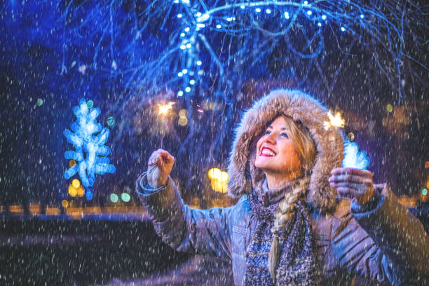 istock Woman enjoying in the winter night 1184249991