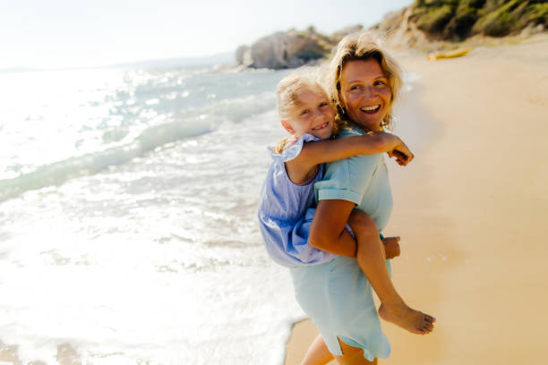 istock Enjoying summer morning at the beach 1184251036