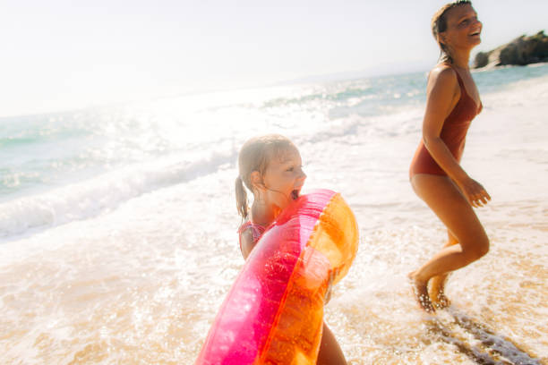 istock With mommy at the beach 1184251047