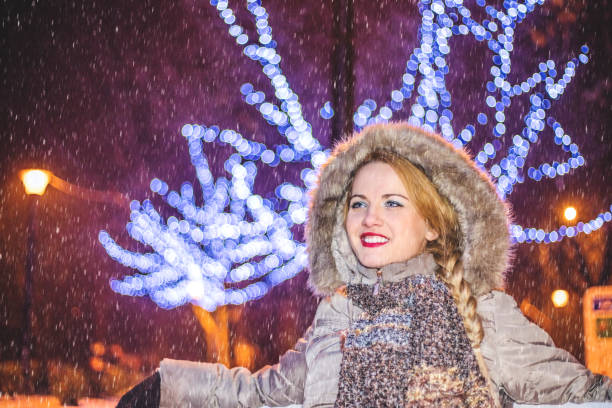 istock Woman enjoying in the winter night 1184251063
