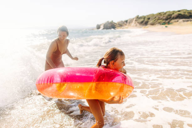 istock With mommy at the beach 1184251089
