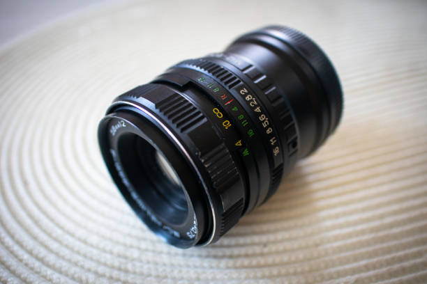 istock Old vintage manual photo lens with adapter for modern mirrorless camera 1184251184