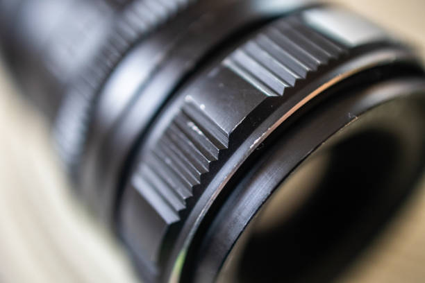 istock Old vintage manual photo lens with adapter for modern mirrorless camera 1184252299