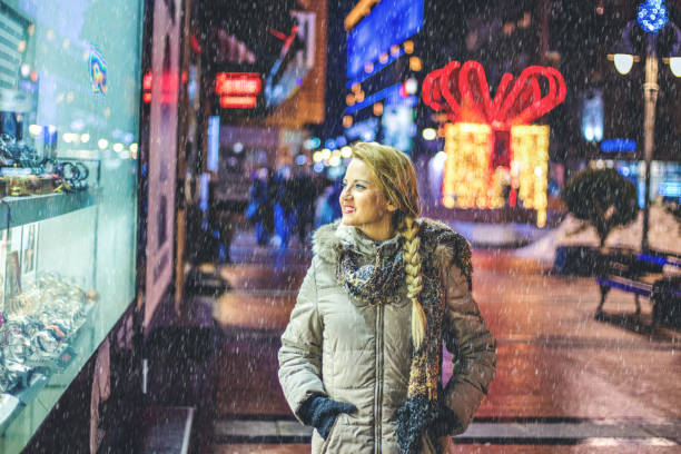 istock Woman enjoying in the winter night 1184252826
