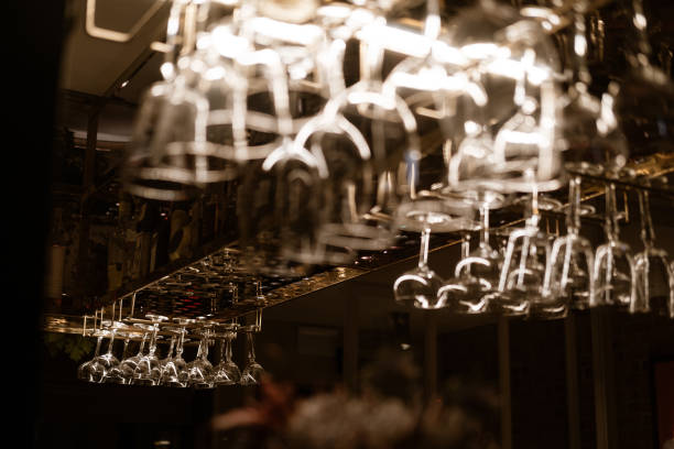 istock Drinking glasses hanging on the rack 1184259652