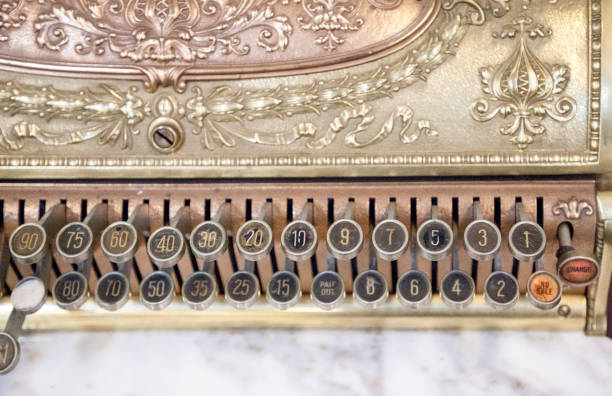 istock Gold and marble colored antique cash register 1184261062