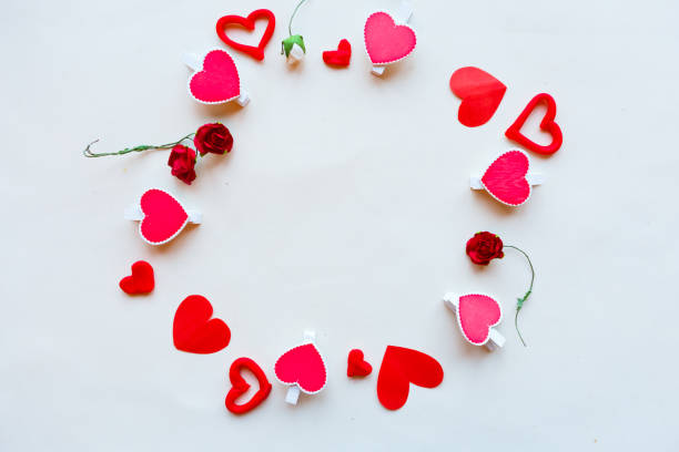 istock Round frame of hearts on white background, flat lay, top view, copy space. Valentine's day greeting card 1184263326