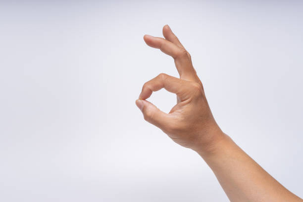 istock Asian man's finger sign 1184263463