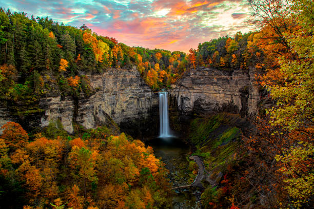 Taughannock Falls Sunset In Full Fall Colors Taughannock Falls State Park Trumansburg Ulysses Ithaca NY Finger Lakes Upstate New York Empire State riverbank photos stock pictures, royalty-free photos & images