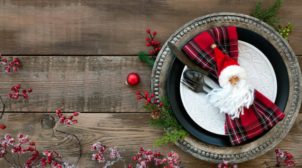 istock Christmas Dining Plate on an Old Wood Table 1184266368